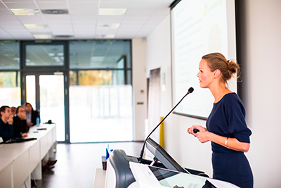 Woman speaking at conference